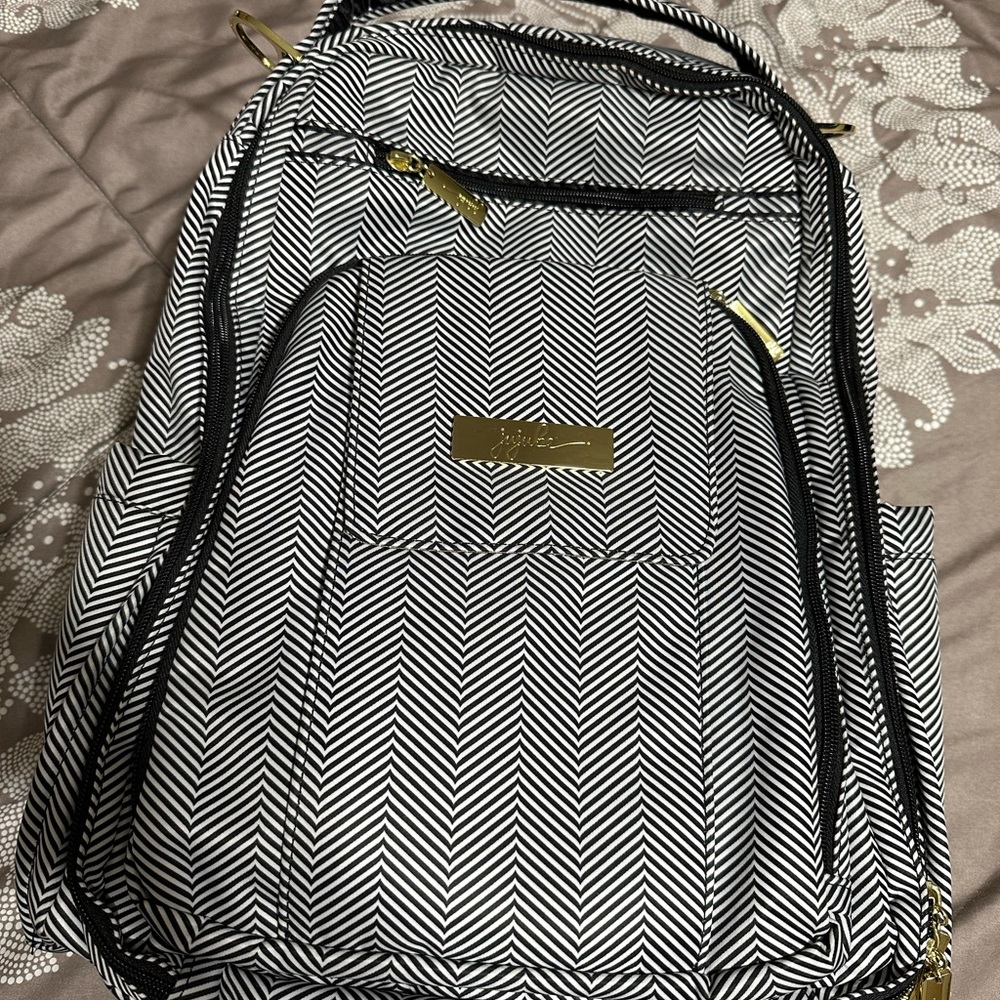 Jujube padded backpack with changing pad. Queen of the Nile print.